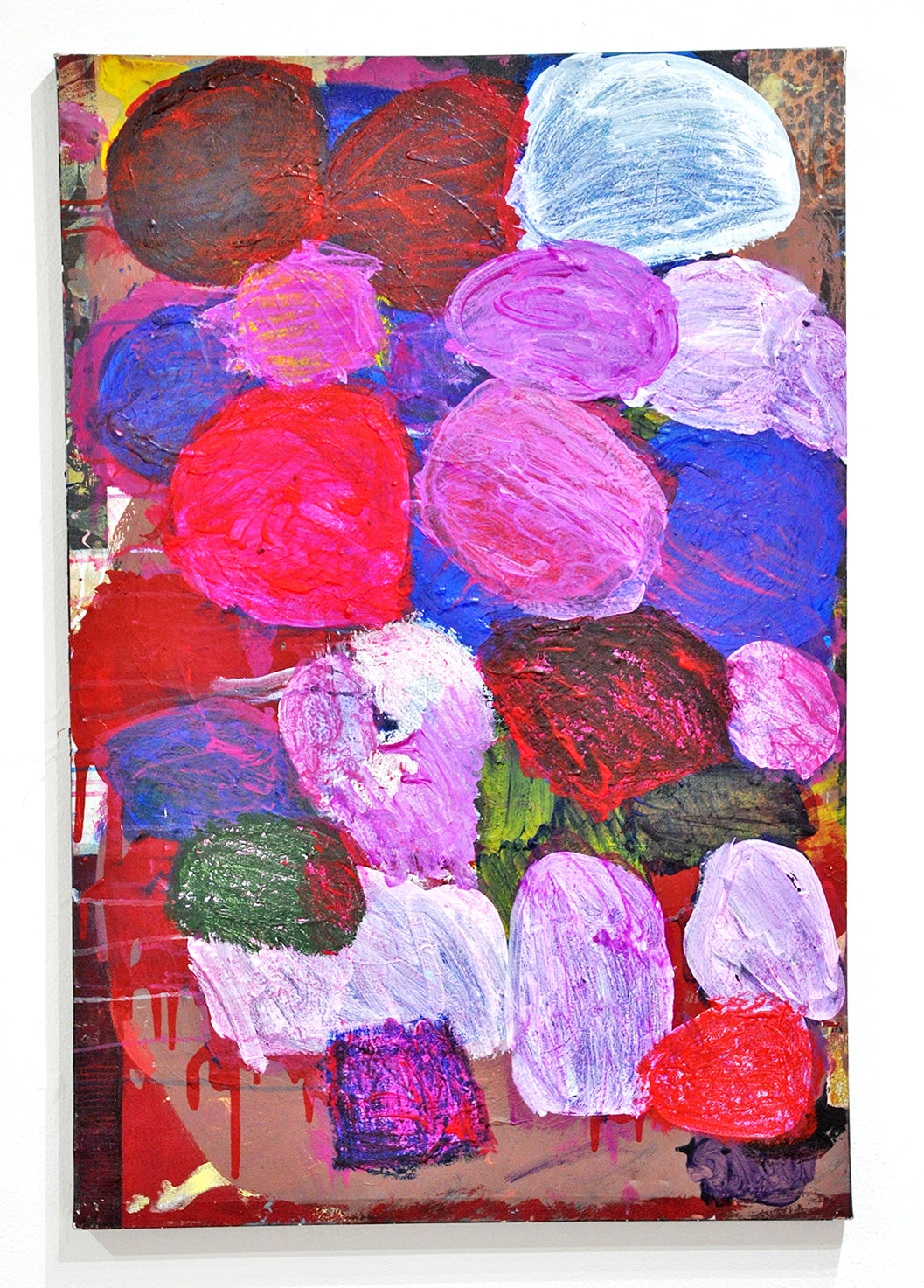 An abstract, vertically oriented painting. There are a number of roundish, shapes that overlap in vibrant colors including pink, red, blue, and white. In the background there are different colors and textures including leopard print at the top right corner, and red drips of paint towards the bottom left corner. 